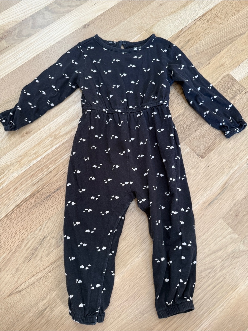 Black Kids One-Piece Jumpsuit with Cream Heart Pattern